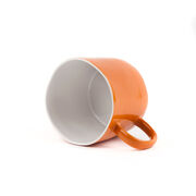 Orange stoneware mug